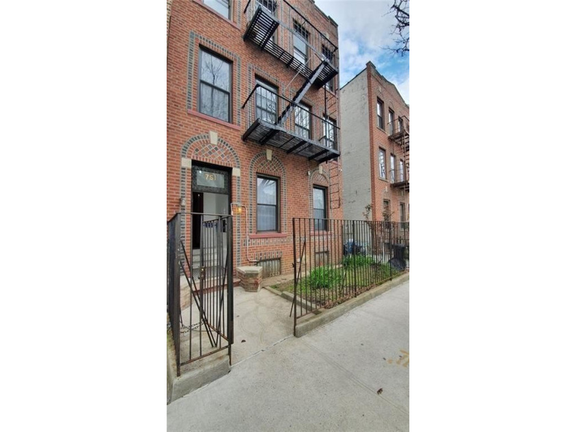 This Multi 6 Family Home has just hit the Midwood Market! The - photo 3
