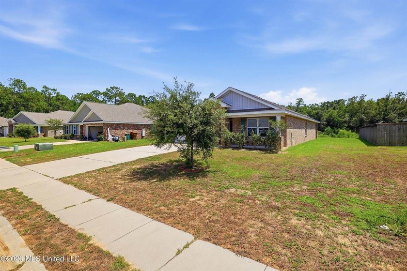 Gorgeous brick home, built in 2022 and located in the highly - photo 5
