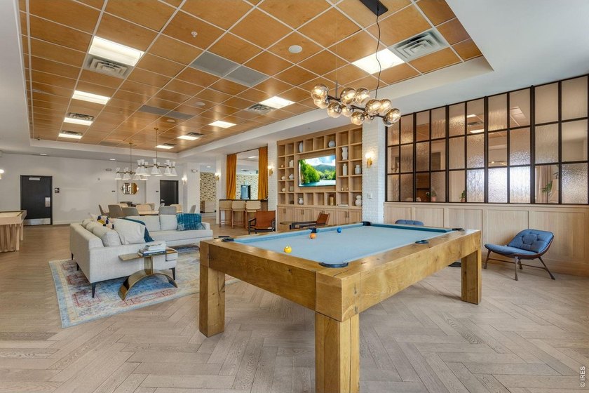 Welcome to a special Peloton West luxury condo - arguably the - photo 34