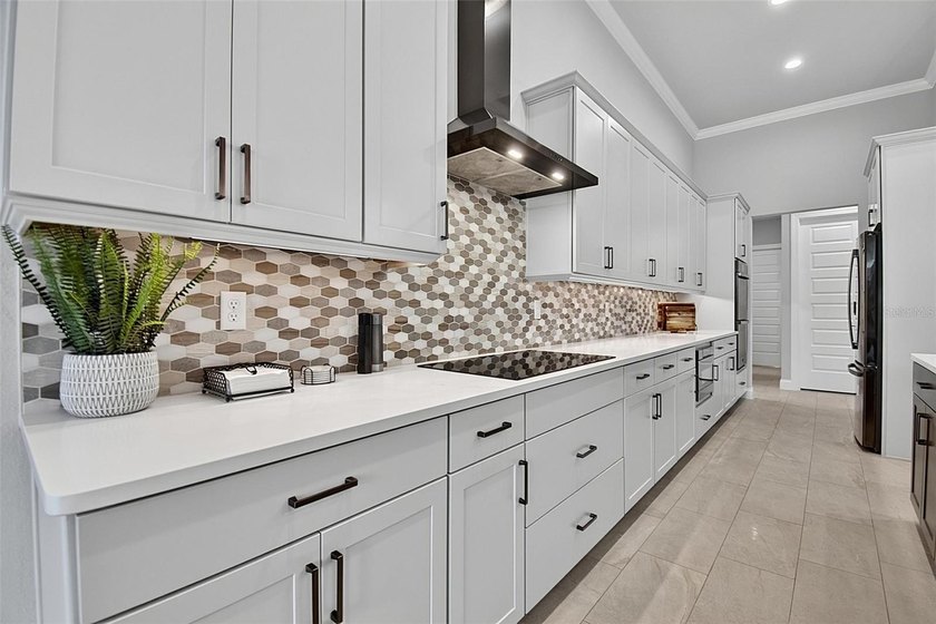 One-of-a-kind custom Gold Coast home, tucked within the private - photo 21