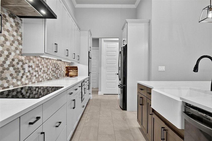 One-of-a-kind custom Gold Coast home, tucked within the private - photo 24