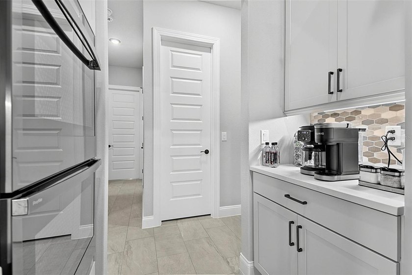 One-of-a-kind custom Gold Coast home, tucked within the private - photo 25