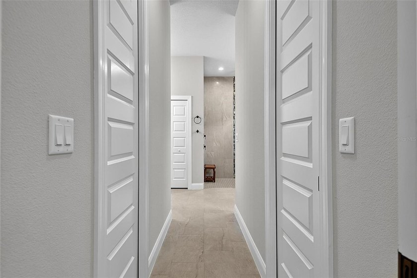 One-of-a-kind custom Gold Coast home, tucked within the private - photo 34