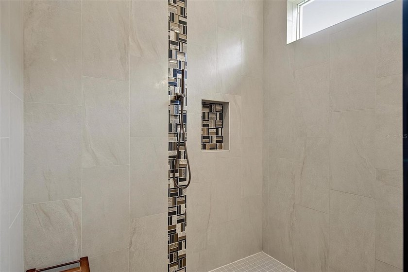 One-of-a-kind custom Gold Coast home, tucked within the private - photo 37
