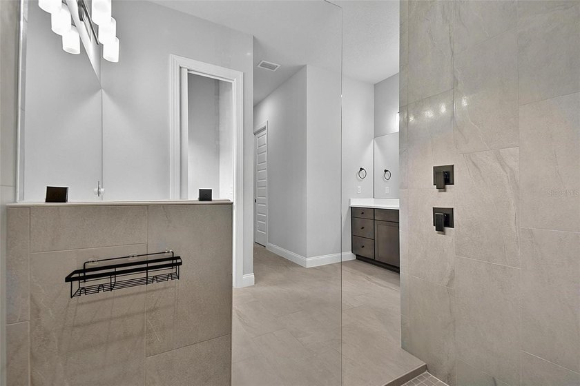 One-of-a-kind custom Gold Coast home, tucked within the private - photo 38