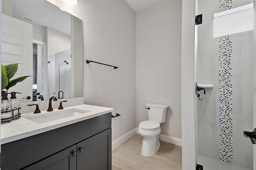 One-of-a-kind custom Gold Coast home, tucked within the private - photo 44