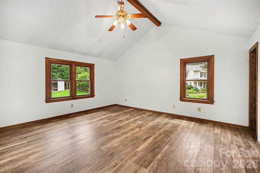 Nestled on approximately half an acre, this beautifully - photo 5