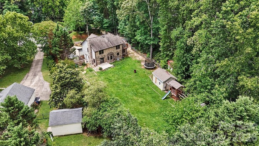 Nestled on approximately half an acre, this beautifully - photo 6