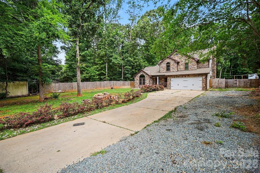 Nestled on approximately half an acre, this beautifully - photo 8