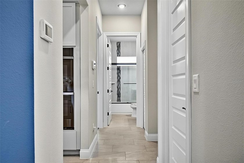 One-of-a-kind custom Gold Coast home, tucked within the private - photo 50