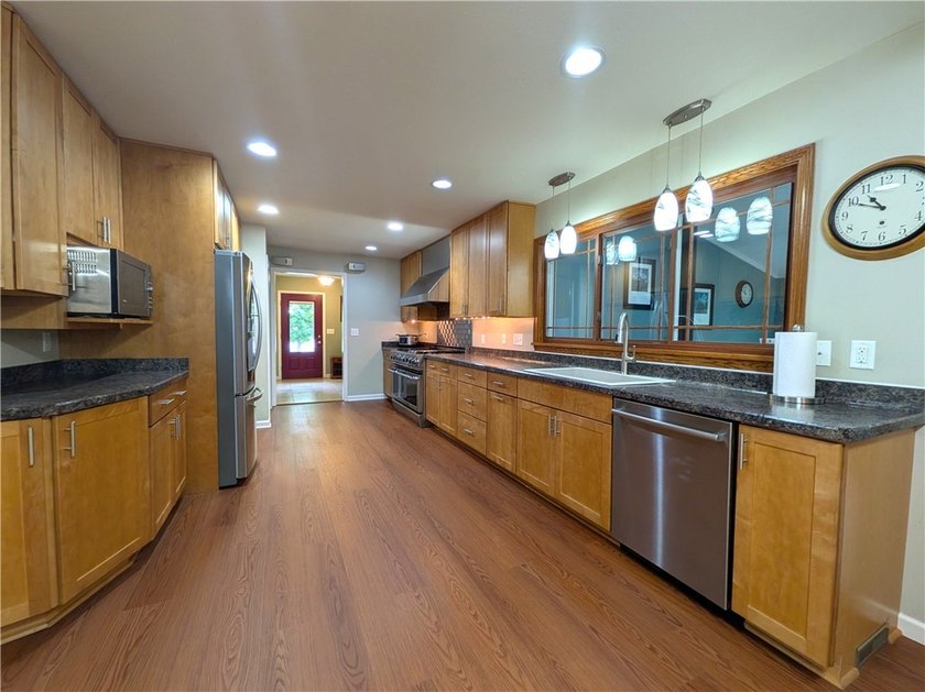 Welcome to this spacious and thoughtfully designed home that - photo 4