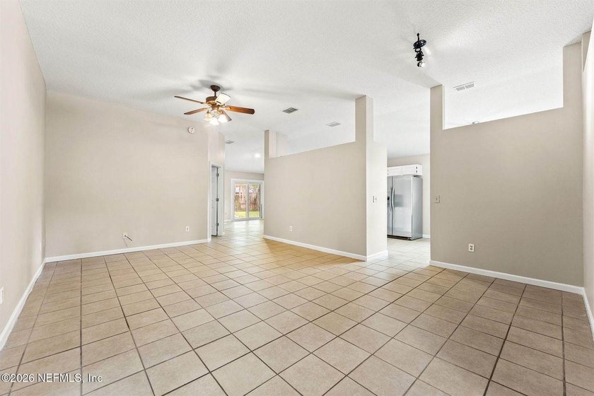 Welcome home to Bay Harbor! This spacious 4 bedroom, 2 bath - photo 6