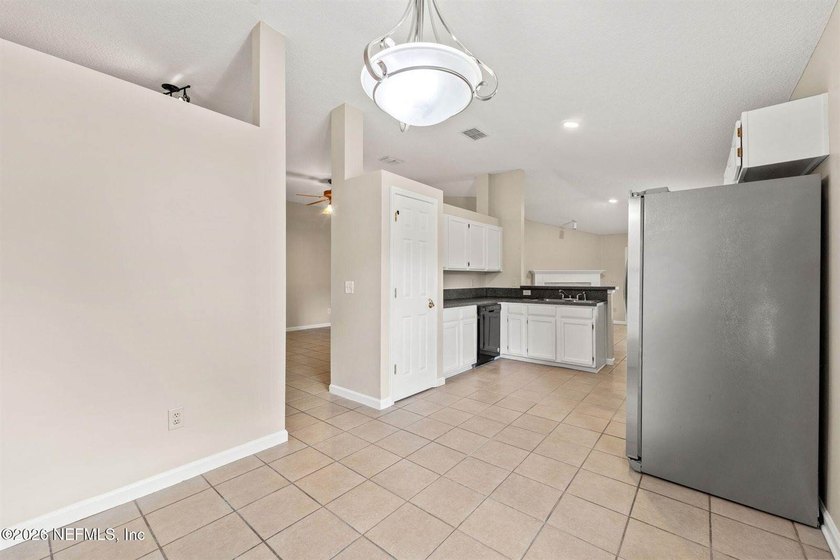 Welcome home to Bay Harbor! This spacious 4 bedroom, 2 bath - photo 10