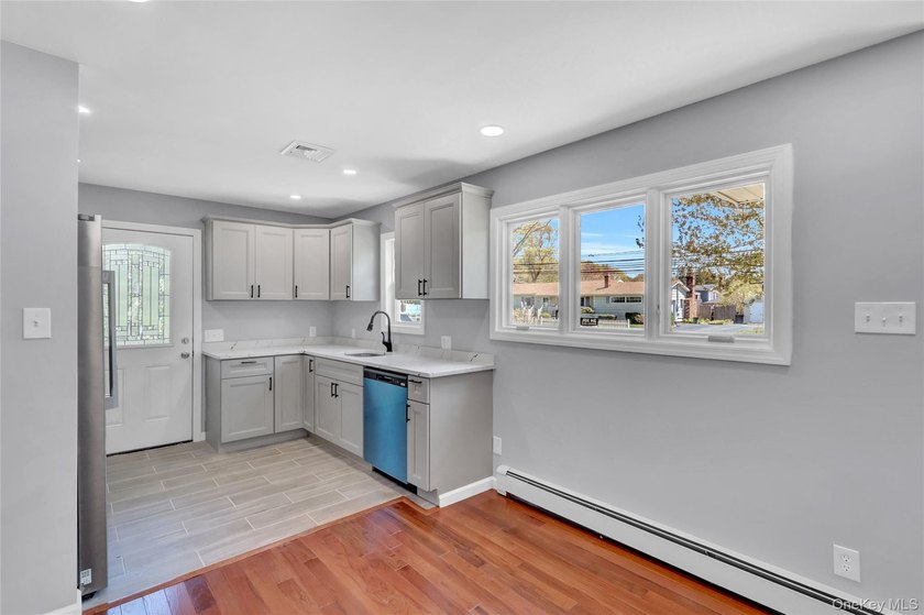 Lovely Patchogue Living! Enjoy This Beautifully Designed And - photo 7