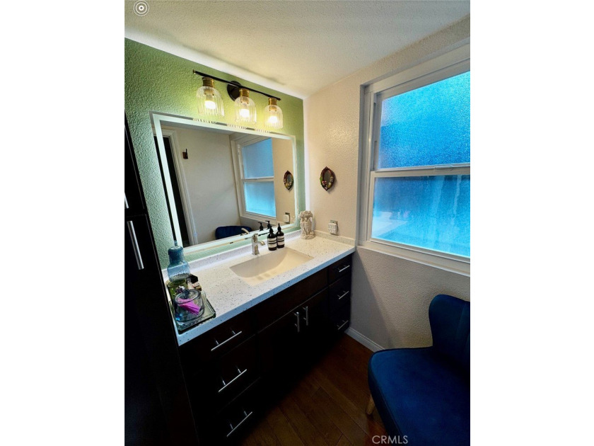 Welcome to this beautifully updated end-unit condo in the - photo 12