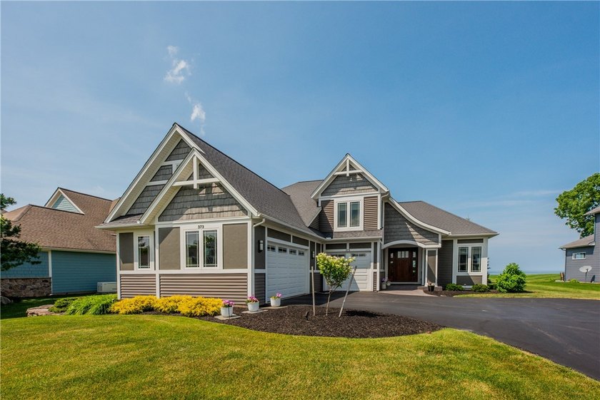 Welcome to waterfront living at its finest. Perched above the - photo 4