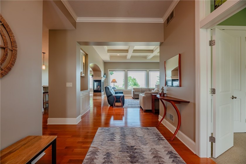 Welcome to waterfront living at its finest. Perched above the - photo 6