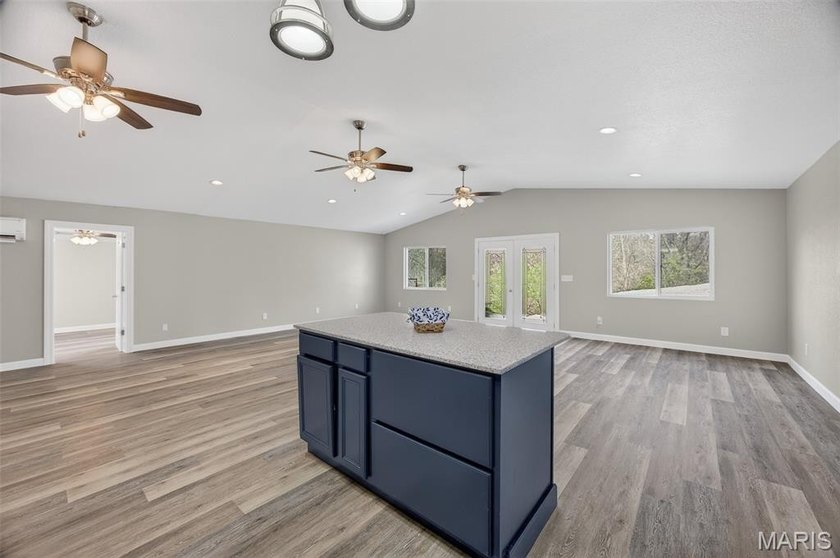 Vaulted ceilings, natural light, and quick lake access. This is - photo 11