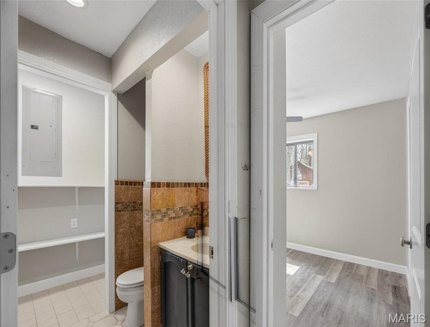 Vaulted ceilings, natural light, and quick lake access. This is - photo 12