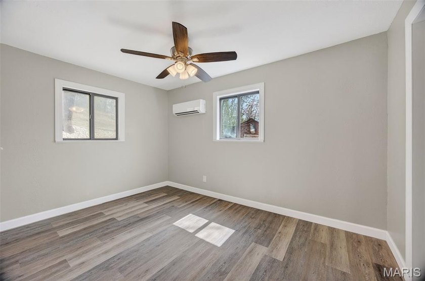 Vaulted ceilings, natural light, and quick lake access. This is - photo 17