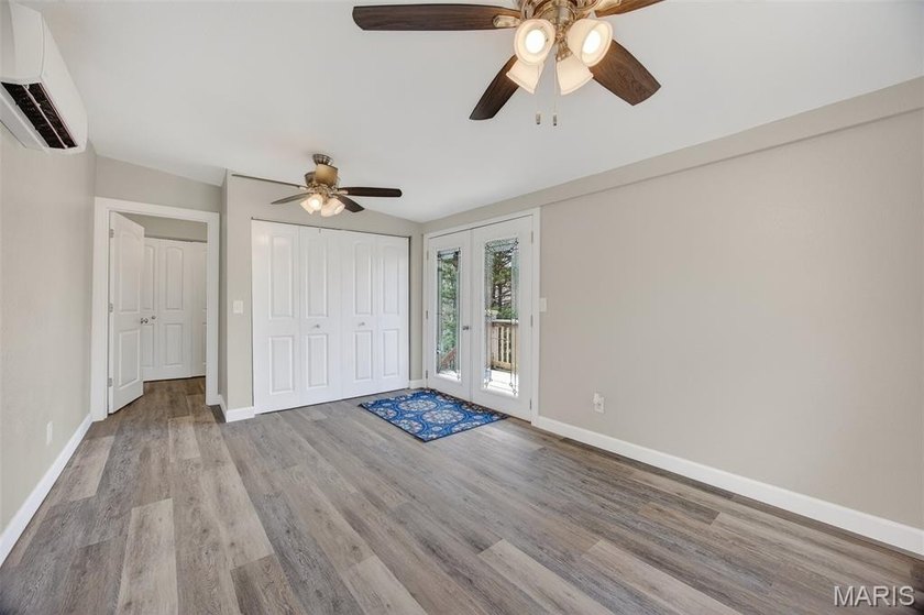 Vaulted ceilings, natural light, and quick lake access. This is - photo 22