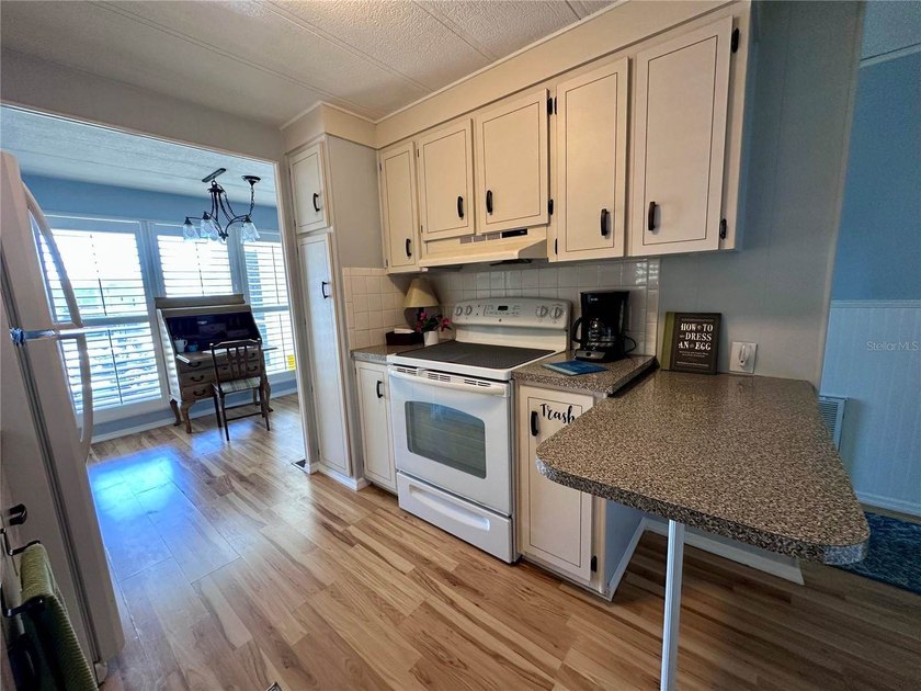 Virtually Staged. Located in a quiet and favorable area within - photo 9