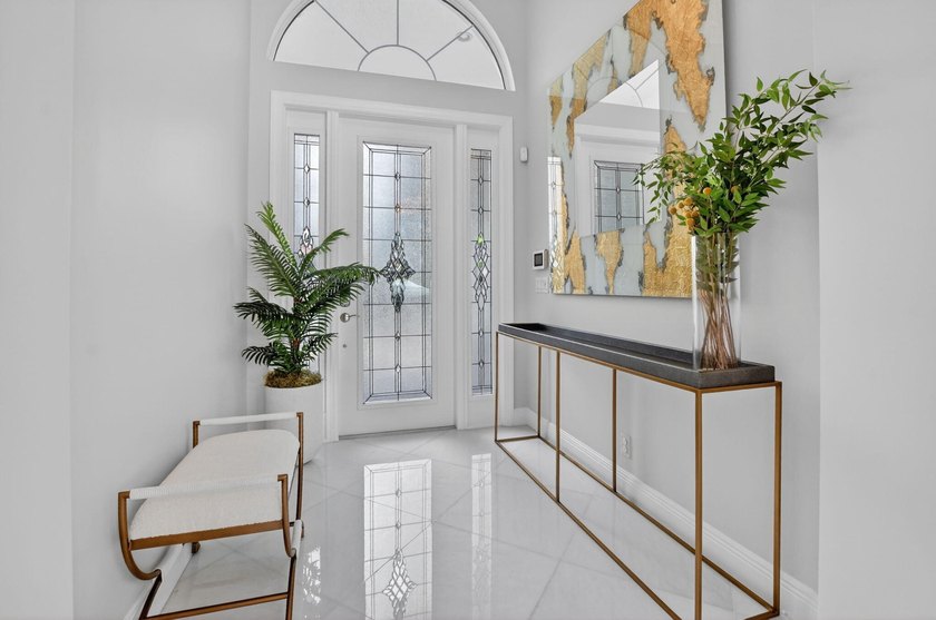 Situated on an oversized lot within the gated community of Azura - photo 15