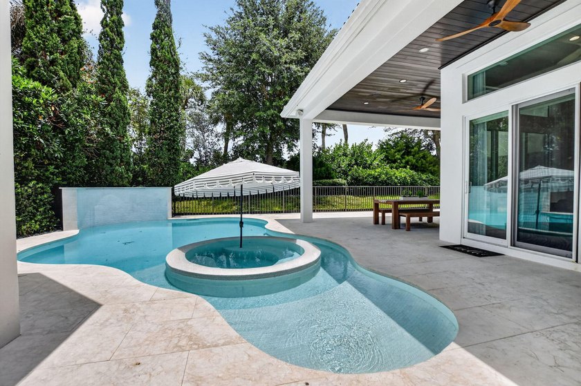 Situated on an oversized lot within the gated community of Azura - photo 28