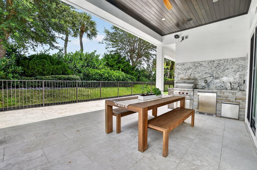 Situated on an oversized lot within the gated community of Azura - photo 31