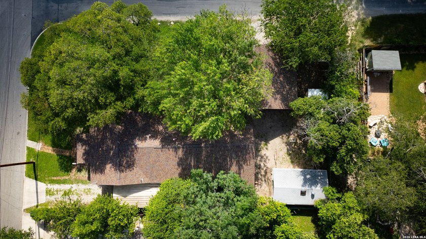 Situated on a spacious corner lot in one of San Antonio's most - photo 6