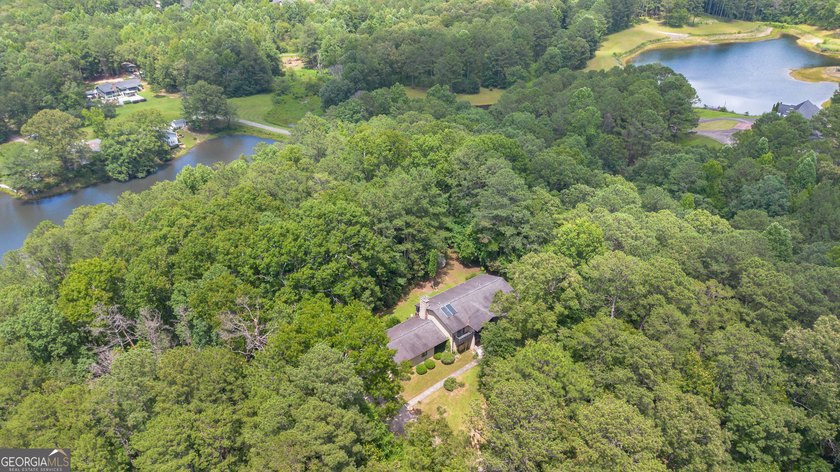 Well cared for and beautifully positioned on nearly 4 acres with - photo 2