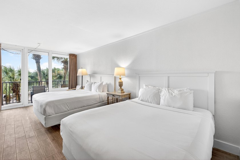 Renovated and rental-ready, this third-floor Bayside at - photo 2