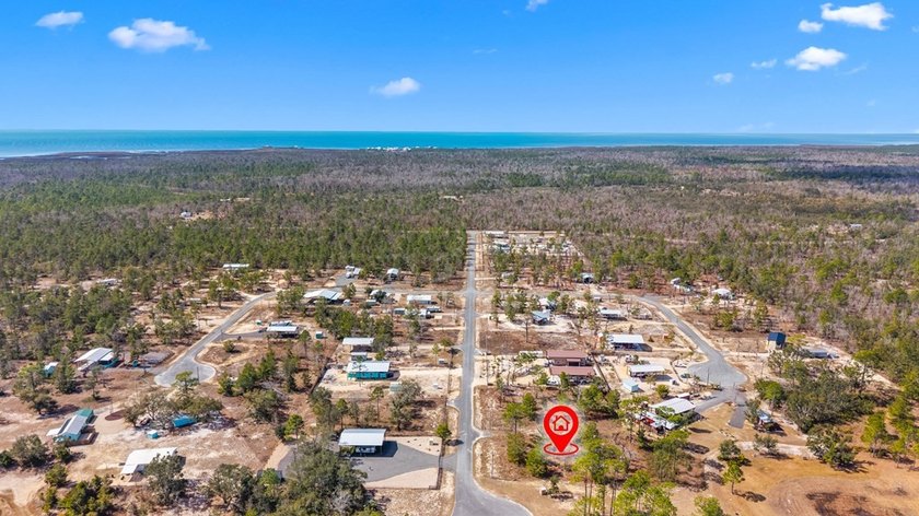 KEATON BEACH LOVERS! Welcome to this 0.69-acre lot in the gated - photo 3