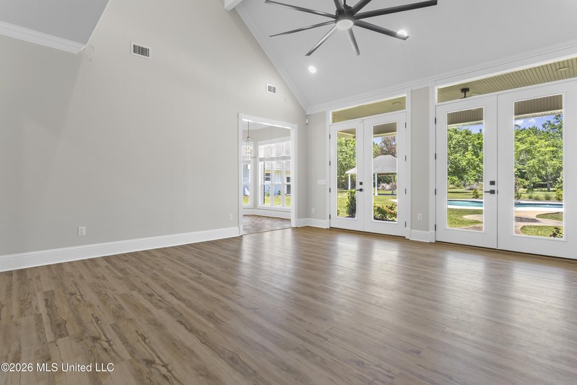Tucked behind a gated entrance on 5 private acres, this - photo 15