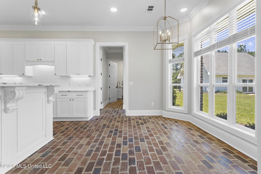 Tucked behind a gated entrance on 5 private acres, this - photo 16
