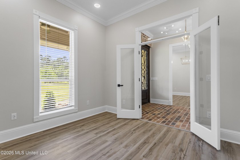 Tucked behind a gated entrance on 5 private acres, this - photo 30