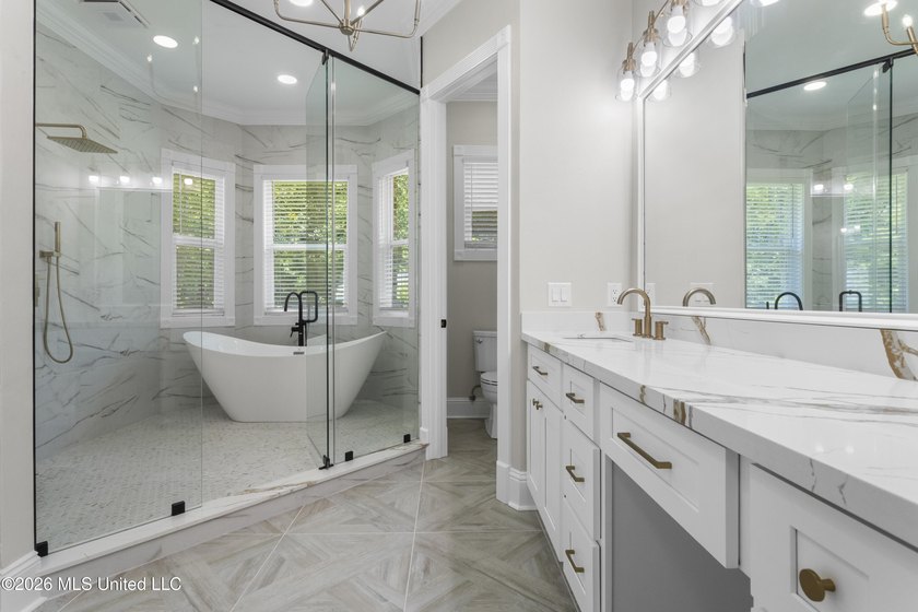 Tucked behind a gated entrance on 5 private acres, this - photo 39