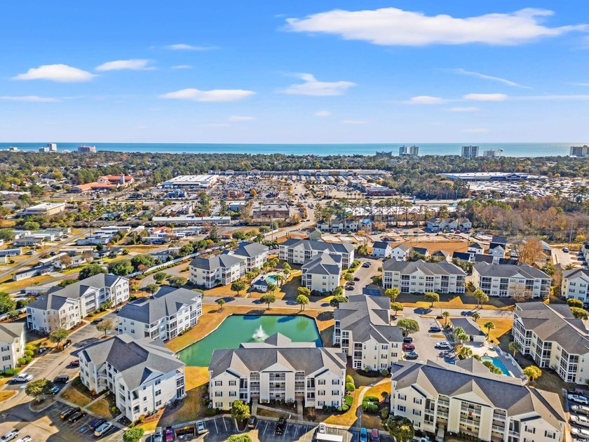 Refined Top-Floor Residence with Waterway and Pool Views in - photo 40
