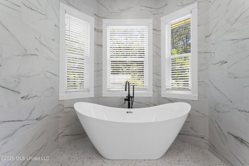 Tucked behind a gated entrance on 5 private acres, this - photo 40