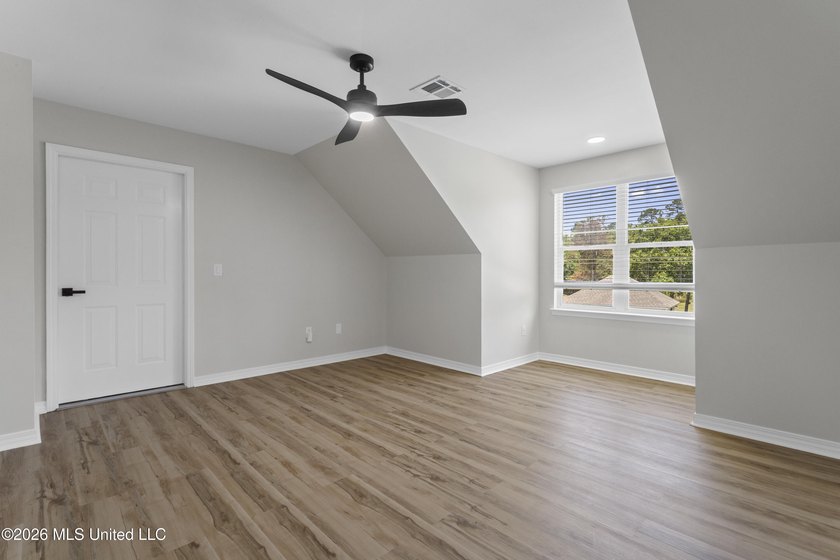 Tucked behind a gated entrance on 5 private acres, this - photo 49