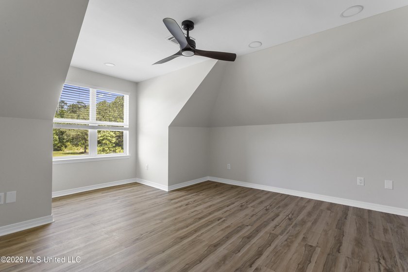 Tucked behind a gated entrance on 5 private acres, this - photo 52