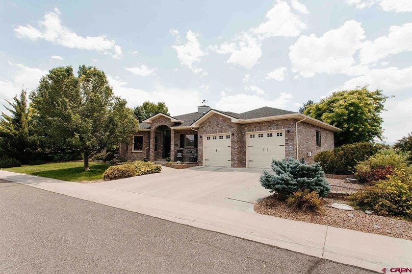 Welcome home to this beautifully updated ranch-style retreat in - photo 3