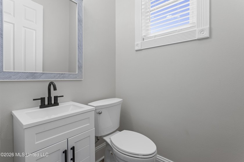 Tucked behind a gated entrance on 5 private acres, this - photo 55