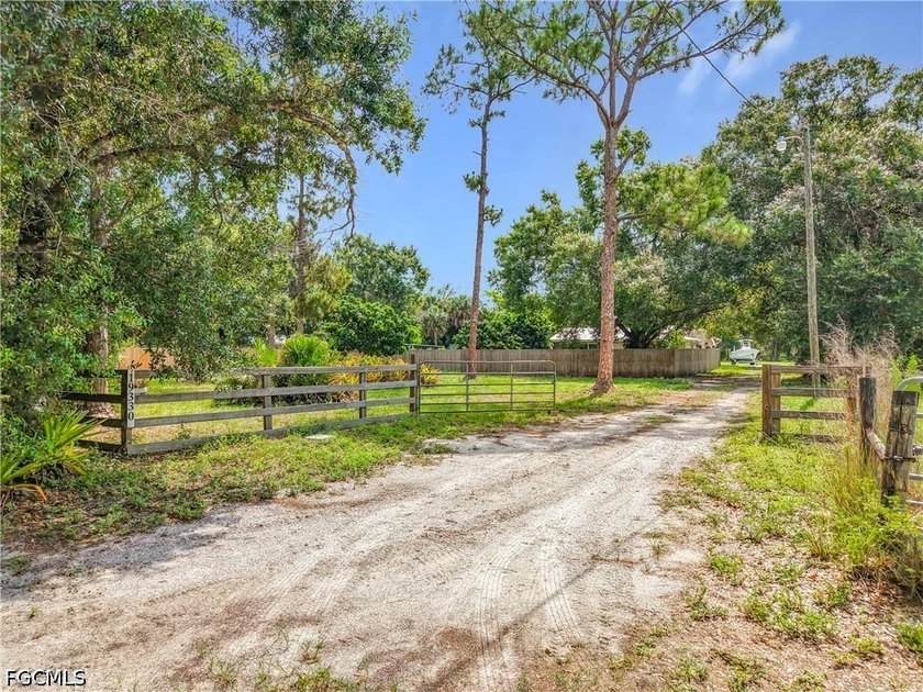 Nestled on just over an acre in North Fort Myers, this charming - photo 50