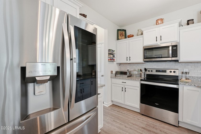 Nice price reduction for this 5 year-old well maintained home - photo 6