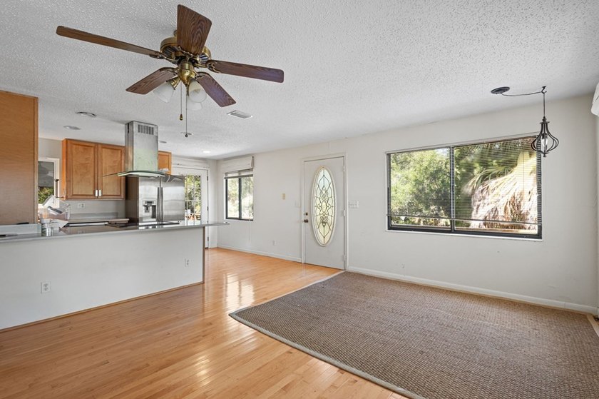Tucked away on a private waterfront peninsula in historic Cedar - photo 8