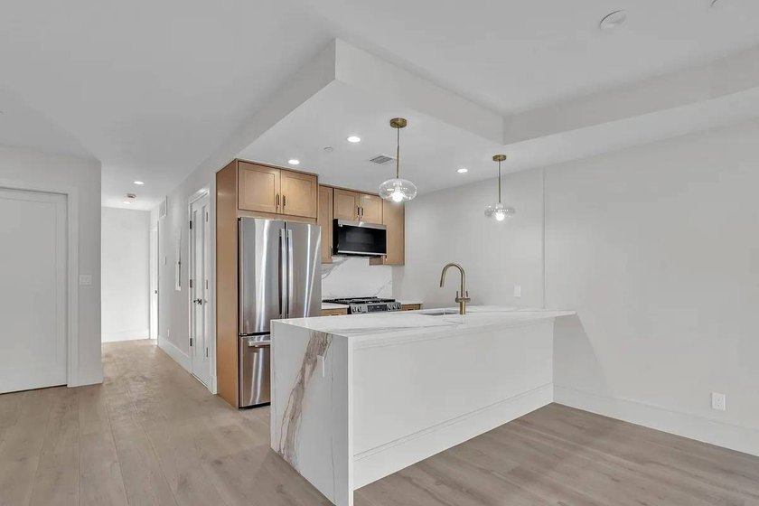 Brand New Penthouse Duplex Condo! SUPER LOW Carrying Costs - photo 4