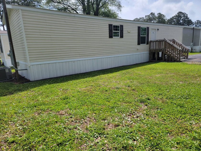 Welcome to this inviting Manufactuerd home located at 127 Hubert - photo 4