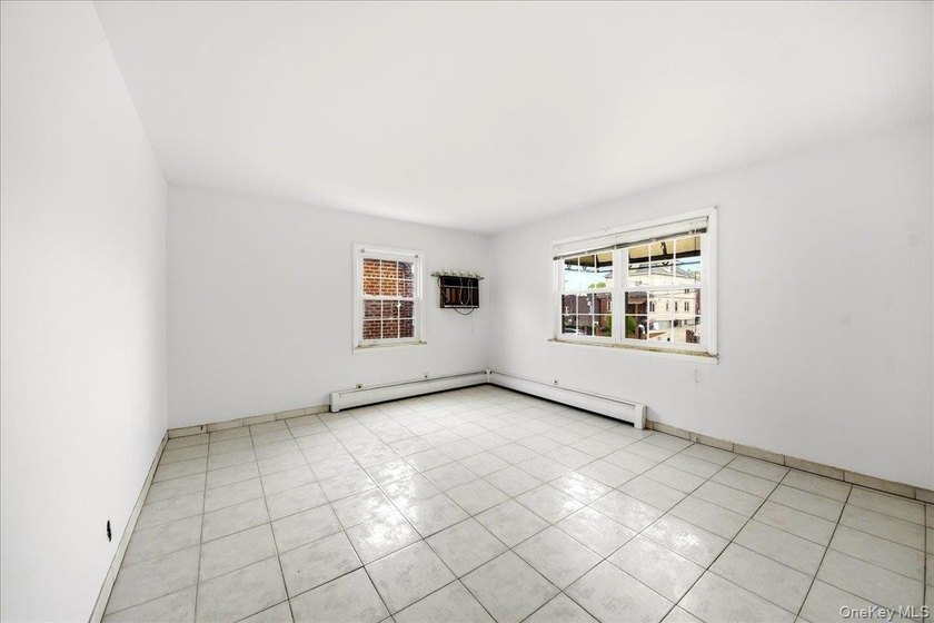 2 family Brick Semi attached Ideally located in Pelham Gardens - photo 3