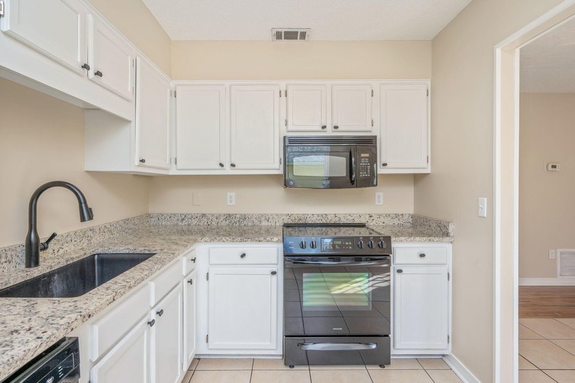 MAJOR PRICE REDUCTION! Backyard OASIS with new deck just - photo 4